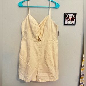 Cream Sleeveless romper with Bow Detail